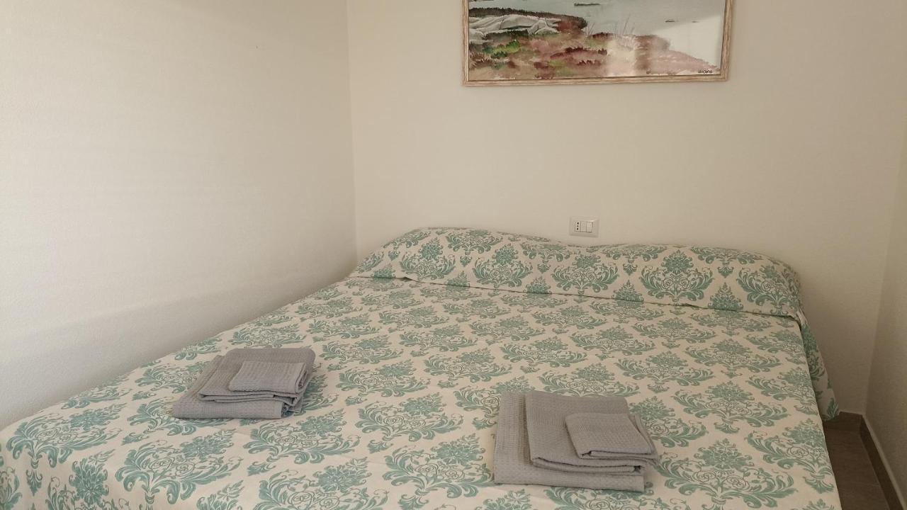 Welcomely - White Terrace - Condominio Acqualife Cannigione Bagian luar foto