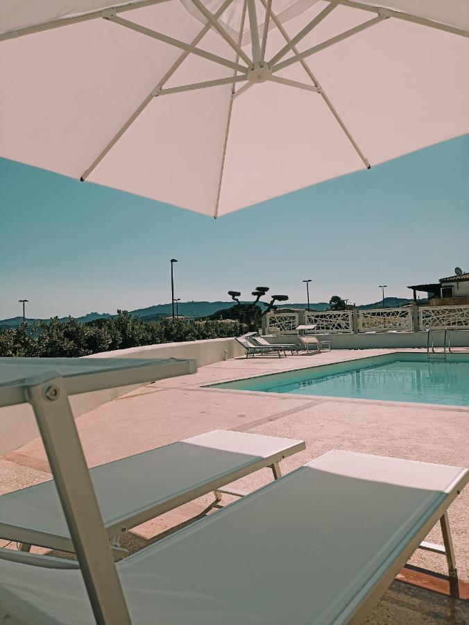 Welcomely - White Terrace - Condominio Acqualife Cannigione Bagian luar foto